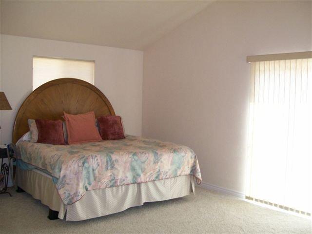 540 Birch Court Rifle, CO 81650 - Photo 4 of 5 a bedroom with a bed and a window
