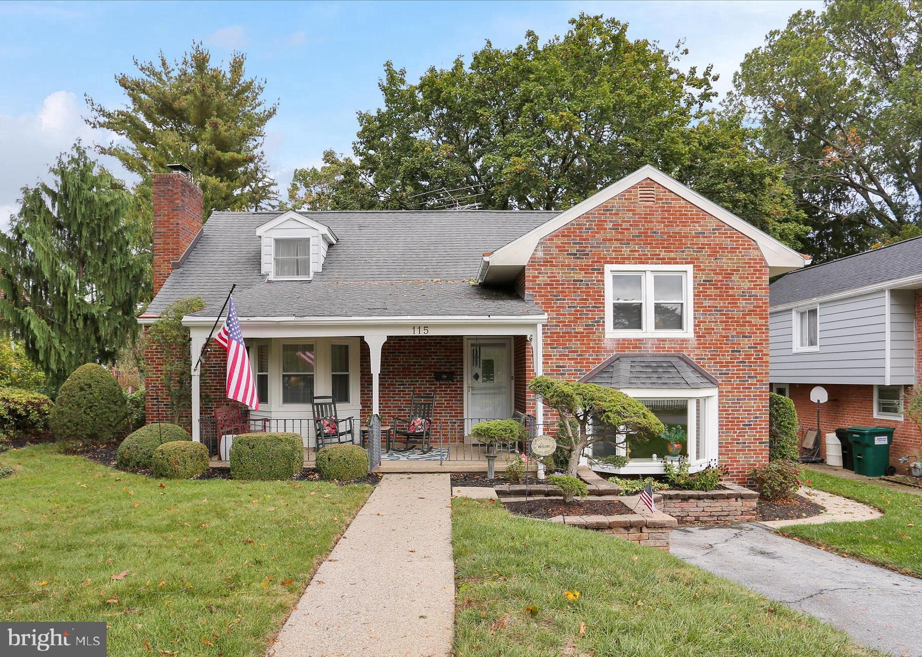 115 Mayer Street Reading, PA 19606 - Photo 1 of 48 a front view of a house with garden
