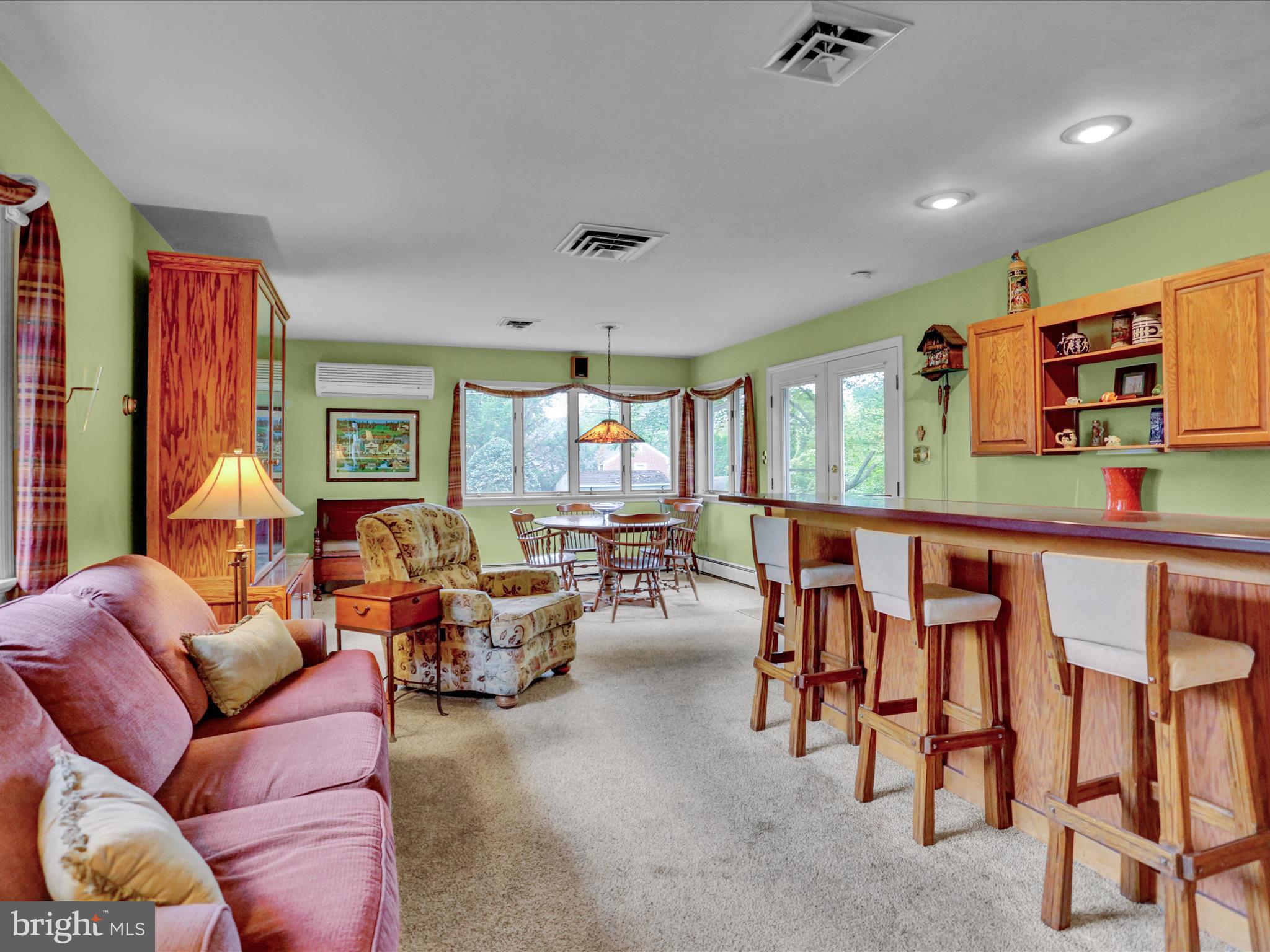 115 Mayer Street Reading, PA 19606 - Photo 11 of 48 a living room with furniture and a flat screen tv