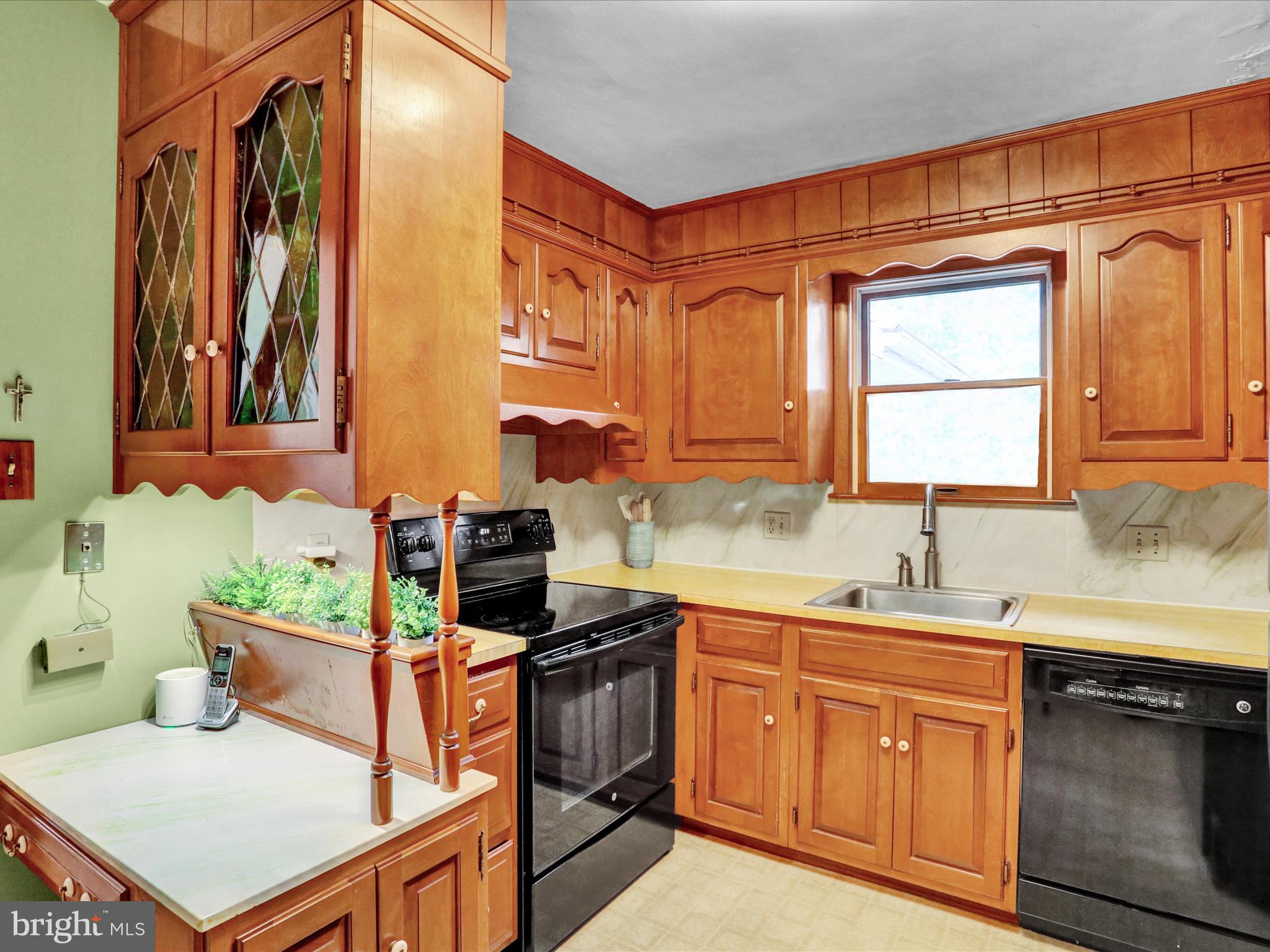 115 Mayer Street Reading, PA 19606 - Photo 15 of 48 a kitchen with stainless steel appliances a sink stove and cabinets