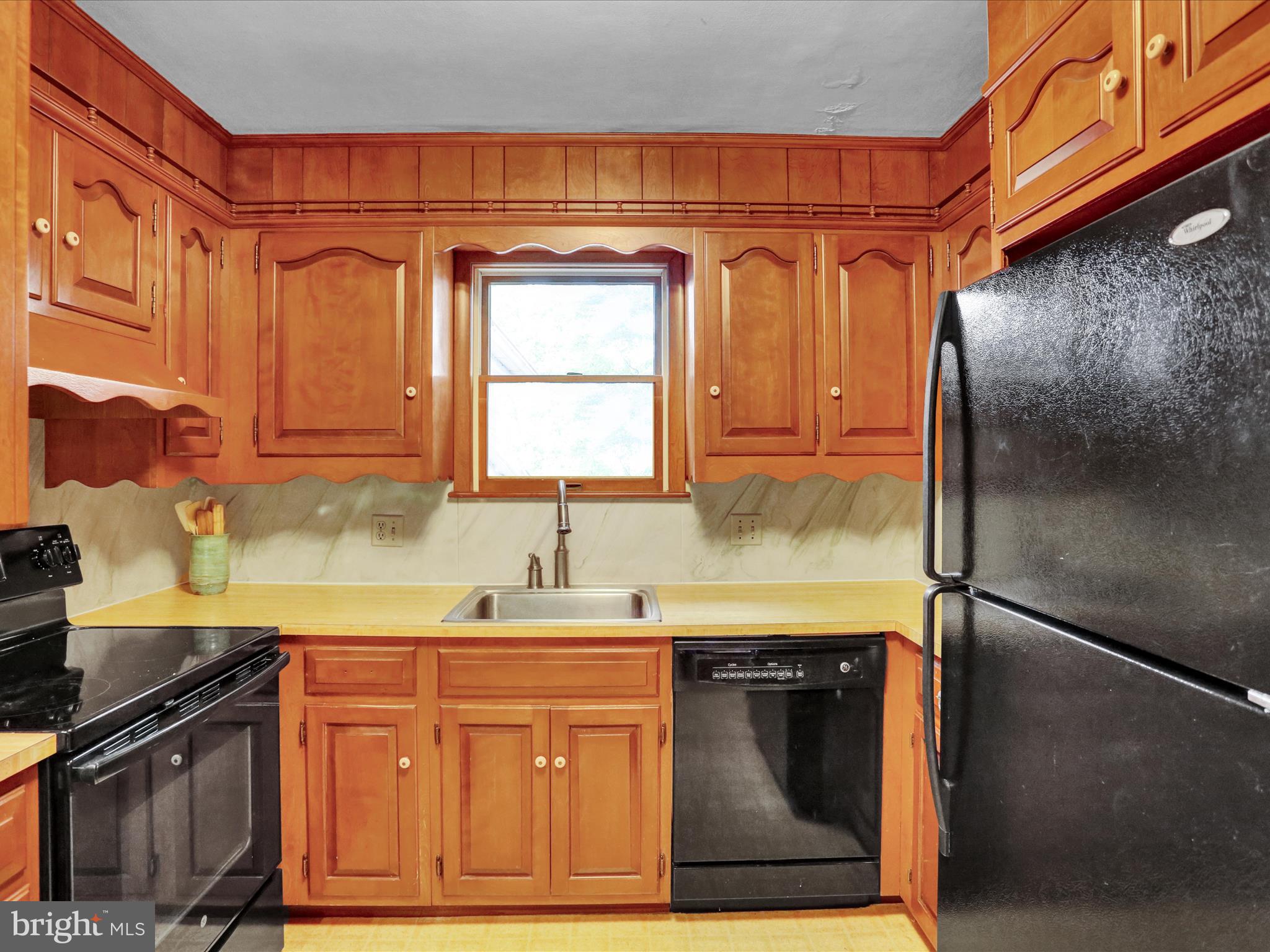 115 Mayer Street Reading, PA 19606 - Photo 16 of 48 a kitchen with stainless steel appliances granite countertop a sink stove and cabinets