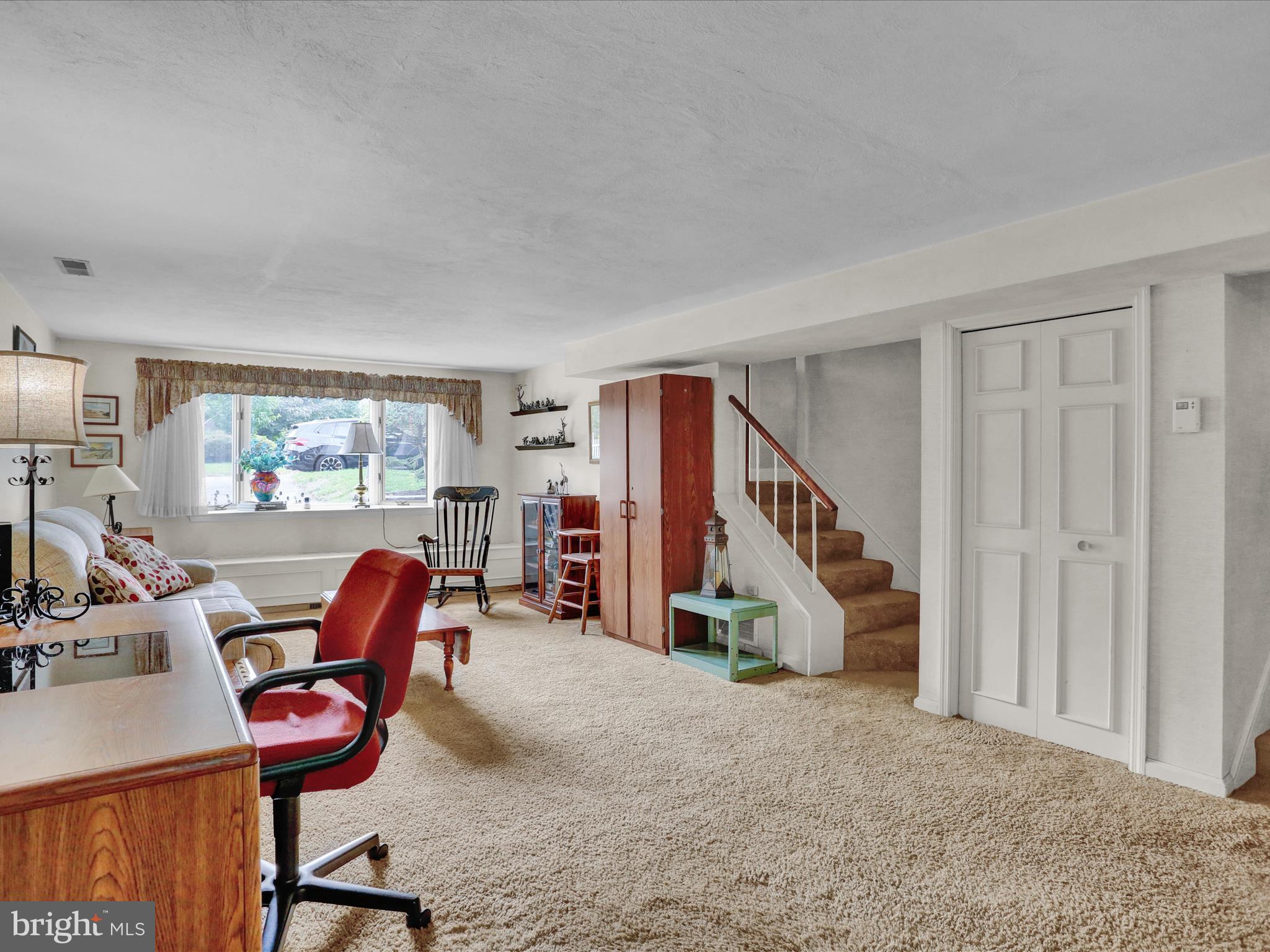 115 Mayer Street Reading, PA 19606 - Photo 18 of 48 a view of a workspace with furniture and a livingroom