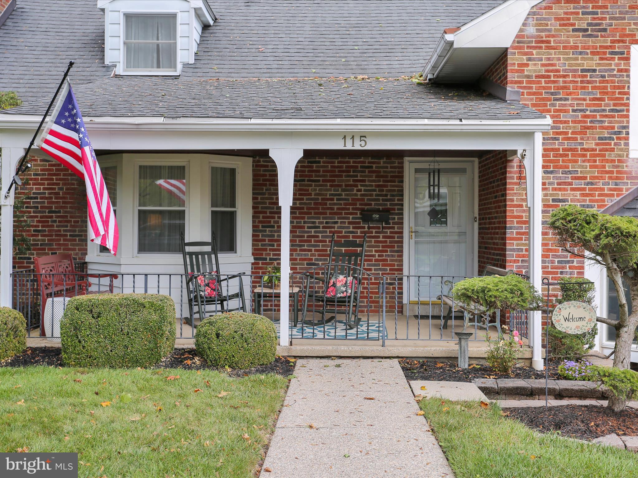 115 Mayer Street Reading, PA 19606 - Photo 2 of 48 a front view of a house with garden