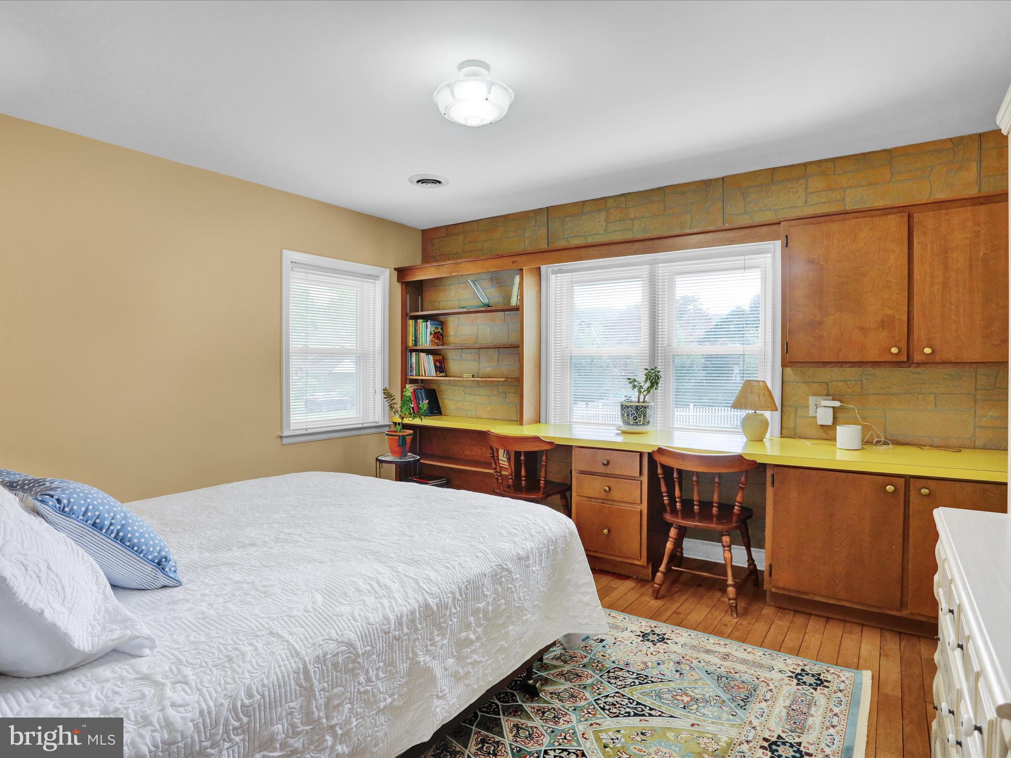 115 Mayer Street Reading, PA 19606 - Photo 24 of 48 a bedroom with a bed and a table in it