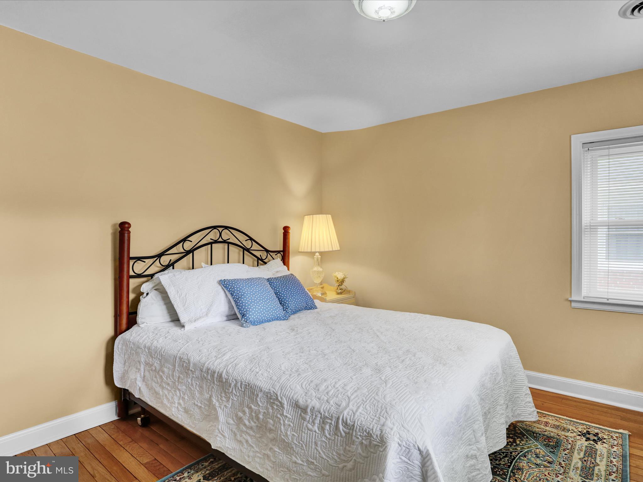 115 Mayer Street Reading, PA 19606 - Photo 25 of 48 a bedroom with a bed and a dresser