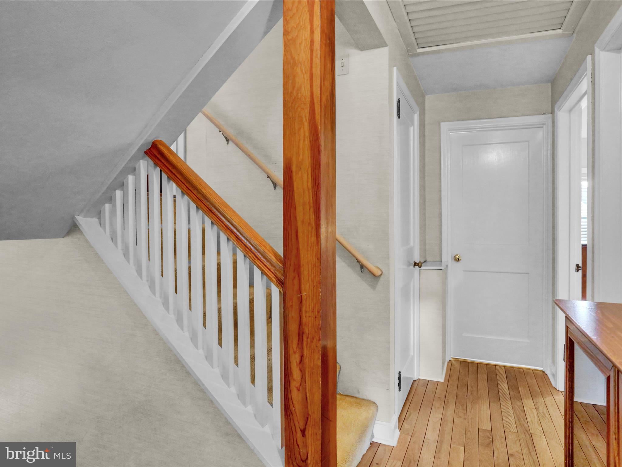 115 Mayer Street Reading, PA 19606 - Photo 26 of 48 a view of a hallway with wooden floor and staircase