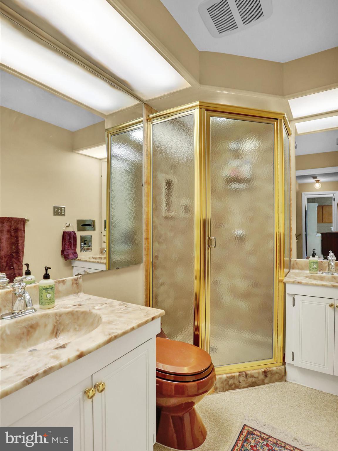 115 Mayer Street Reading, PA 19606 - Photo 32 of 48 a bathroom with a granite countertop sink toilet and shower
