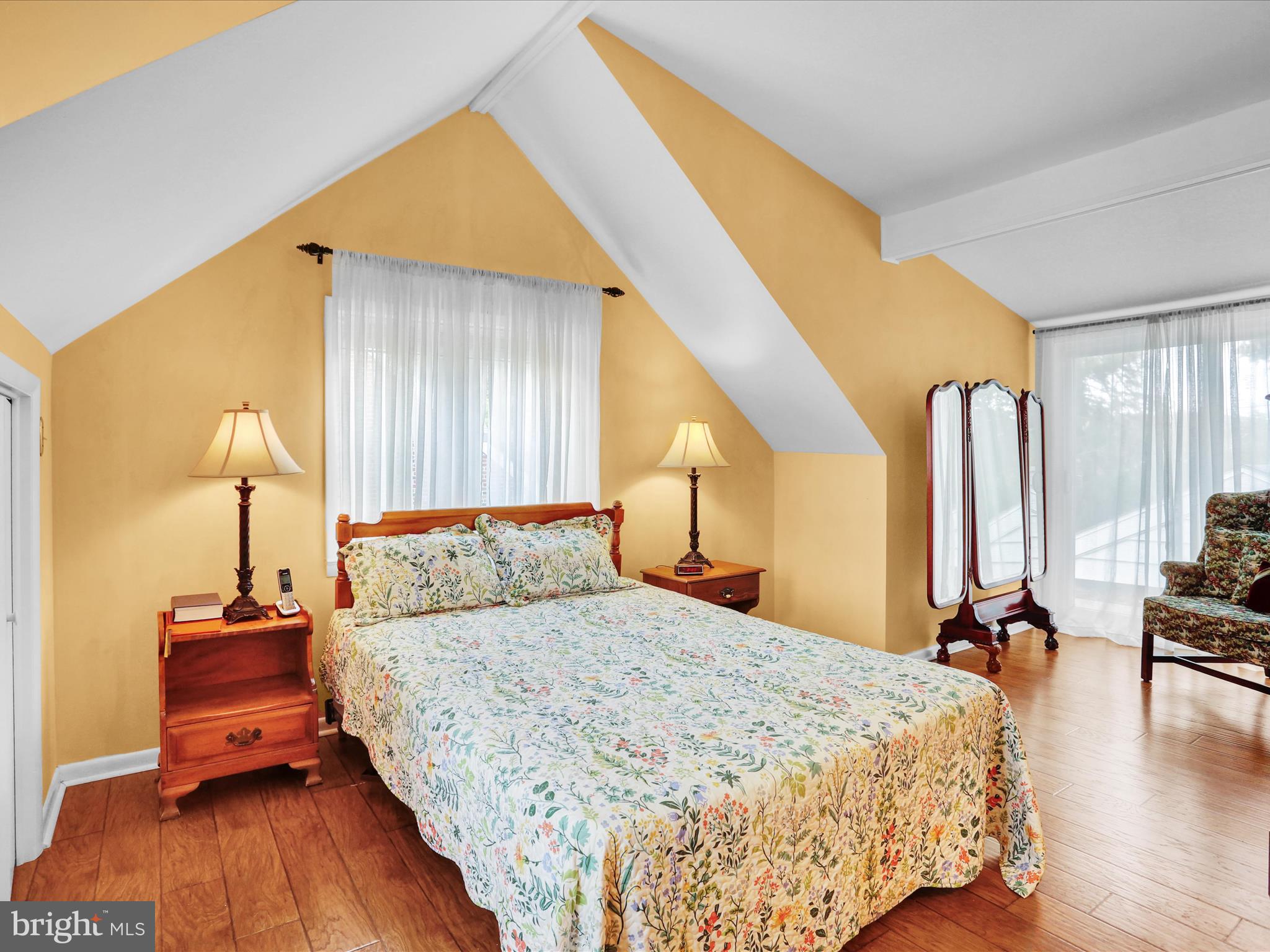 115 Mayer Street Reading, PA 19606 - Photo 34 of 48 a bedroom with a bed and wooden floor