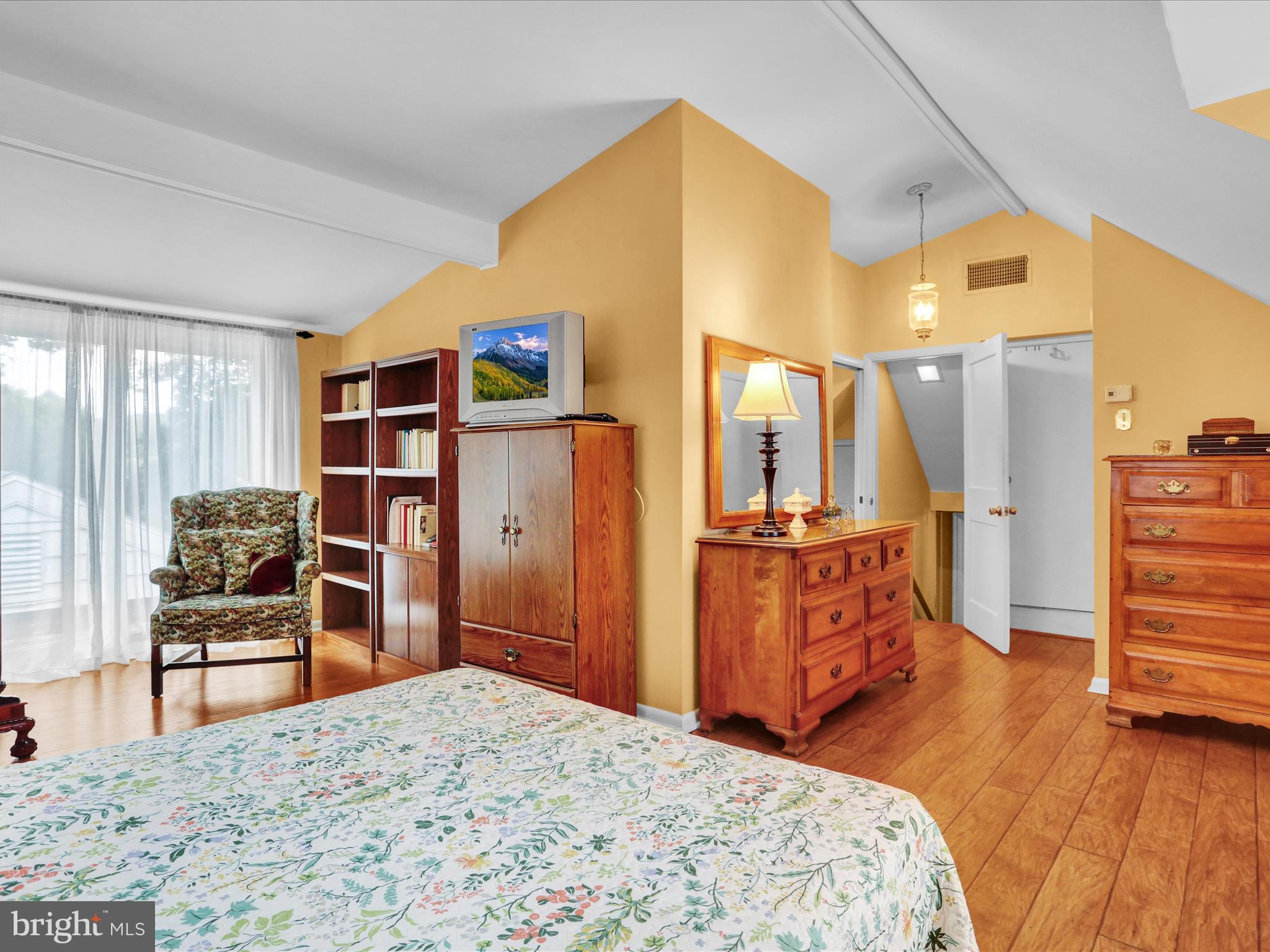 115 Mayer Street Reading, PA 19606 - Photo 35 of 48 a bedroom with a bed and wooden floor