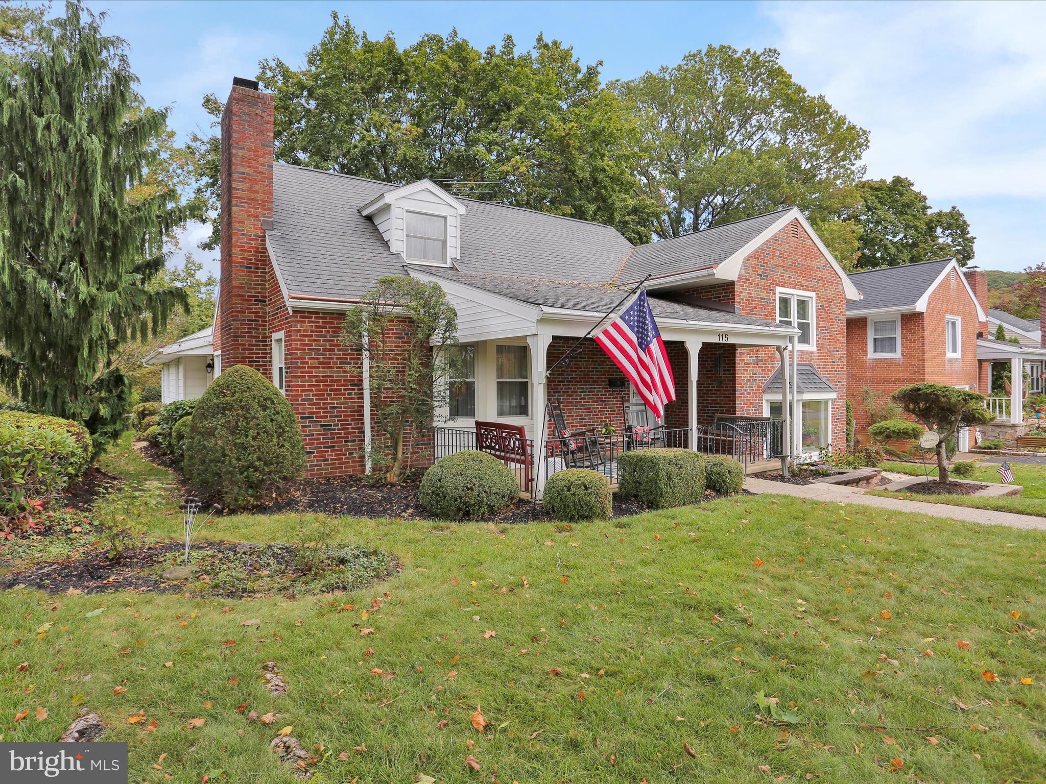 115 Mayer Street Reading, PA 19606 - Photo 46 of 48 a front view of a house with a yard and garage