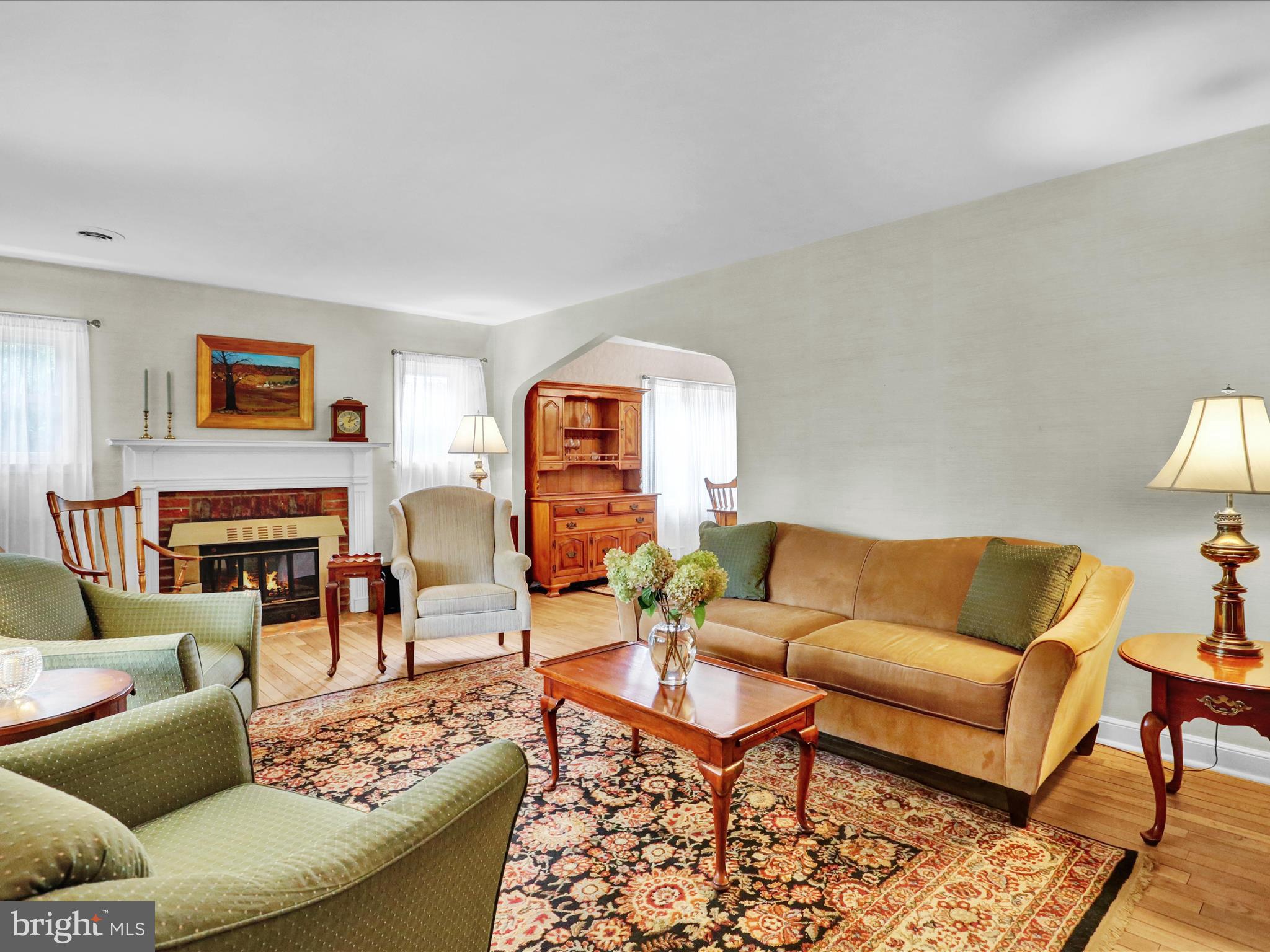 115 Mayer Street Reading, PA 19606 - Photo 5 of 48 a living room with furniture and a fireplace