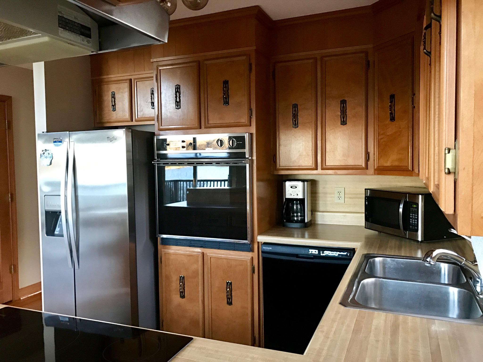 3571 Kemp Ford Road Union Hall, VA 24176 - Photo 8 of 102 a kitchen with stainless steel appliances granite countertop a refrigerator and a sink