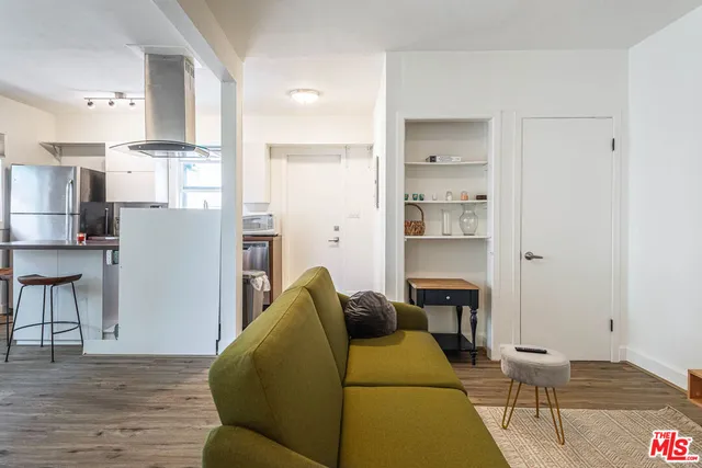 a bedroom with a bed and a table in it