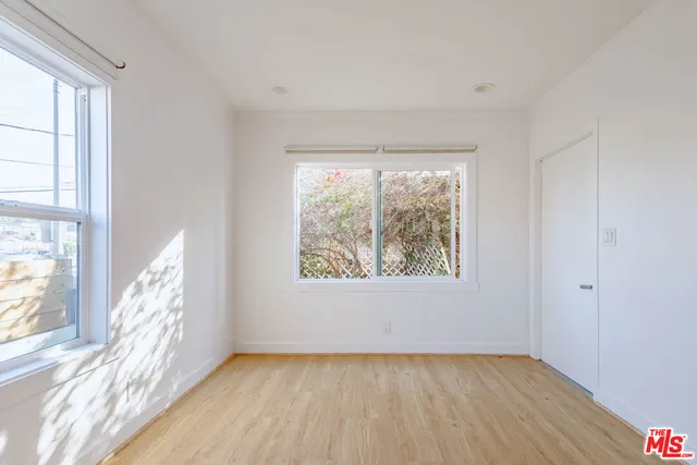 a view of livingroom with hardwood floor and bedroom view