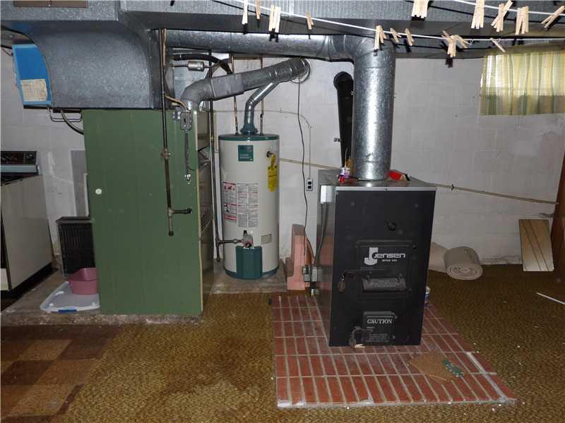 253 Winfield Road Sarver, PA 16055 - Photo 10 of 10 Basement/Game Room. Woodburner is connected to main heating system.