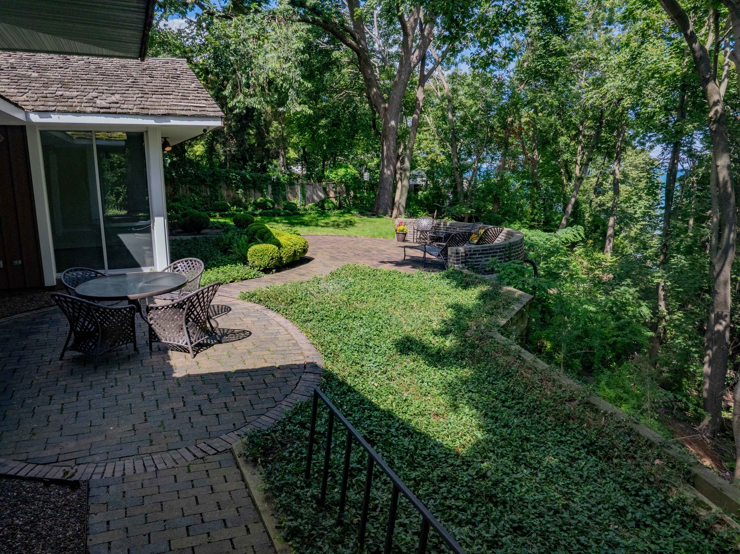 1045 Hillcrest Road Glencoe, IL 60022 - Photo 25 of 32 a view of backyard with barbeque grill and outdoor seating