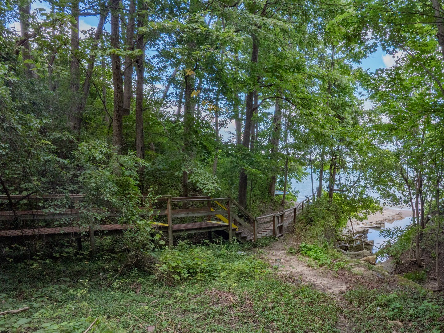 1045 Hillcrest Road Glencoe, IL 60022 - Photo 27 of 32 a backyard of a house with outdoor seating and trees