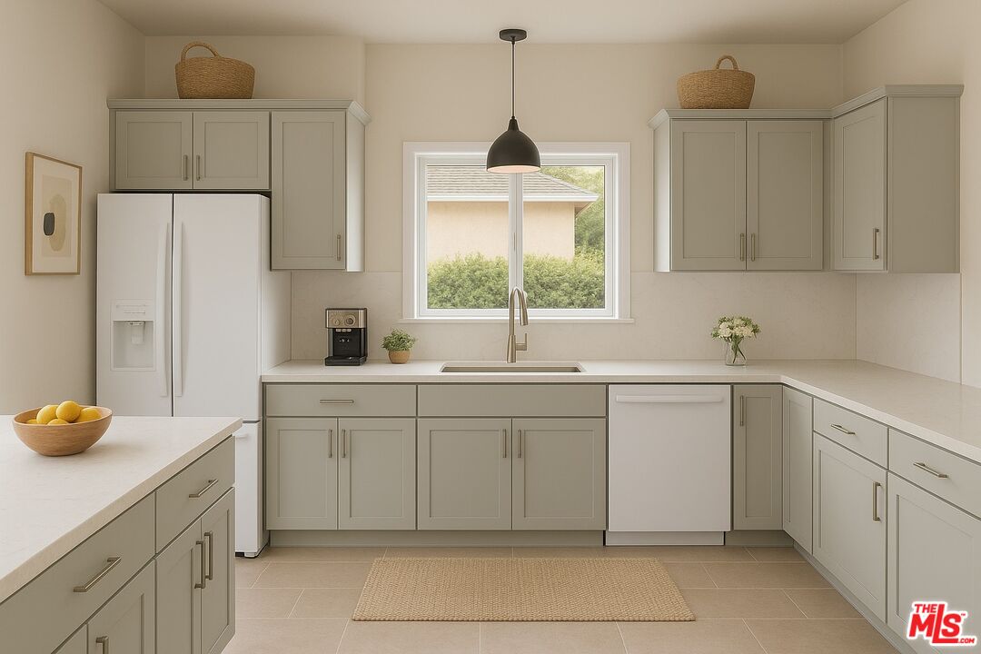 68420 Riviera Road Cathedral City, CA 92234 - Photo 14 of 42 a kitchen with a sink cabinets and window