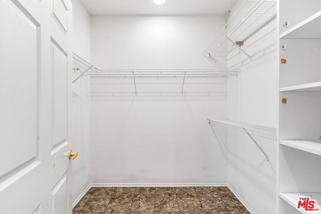 68420 Riviera Road Cathedral City, CA 92234 - Photo 25 of 42 a view of walk in closet