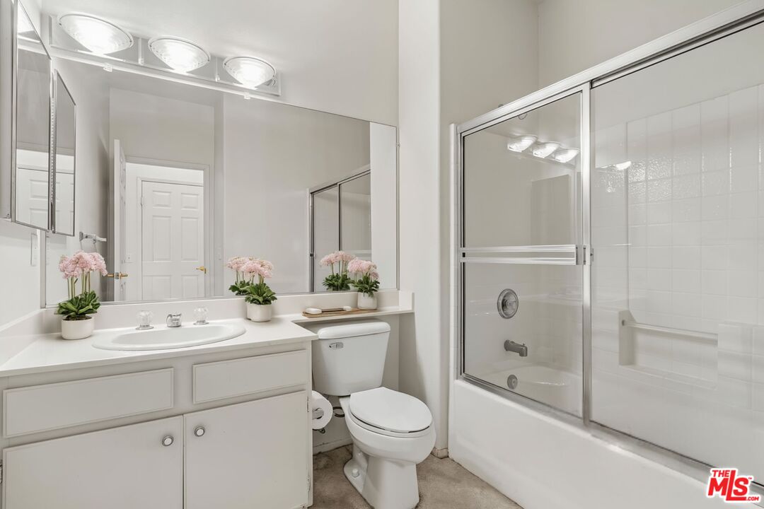 68420 Riviera Road Cathedral City, CA 92234 - Photo 30 of 42 a bathroom with a sink toilet tub and shower