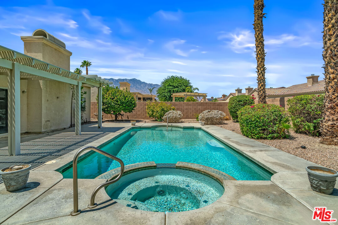 68420 Riviera Road Cathedral City, CA 92234 - Photo 36 of 42 a view of a swimming pool with a patio