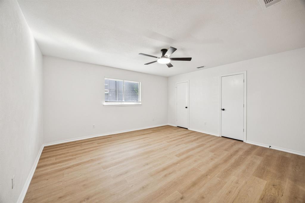 5909 Mark Lane Rowlett, TX 75089 - Photo 12 of 28 a view of an empty room with a window