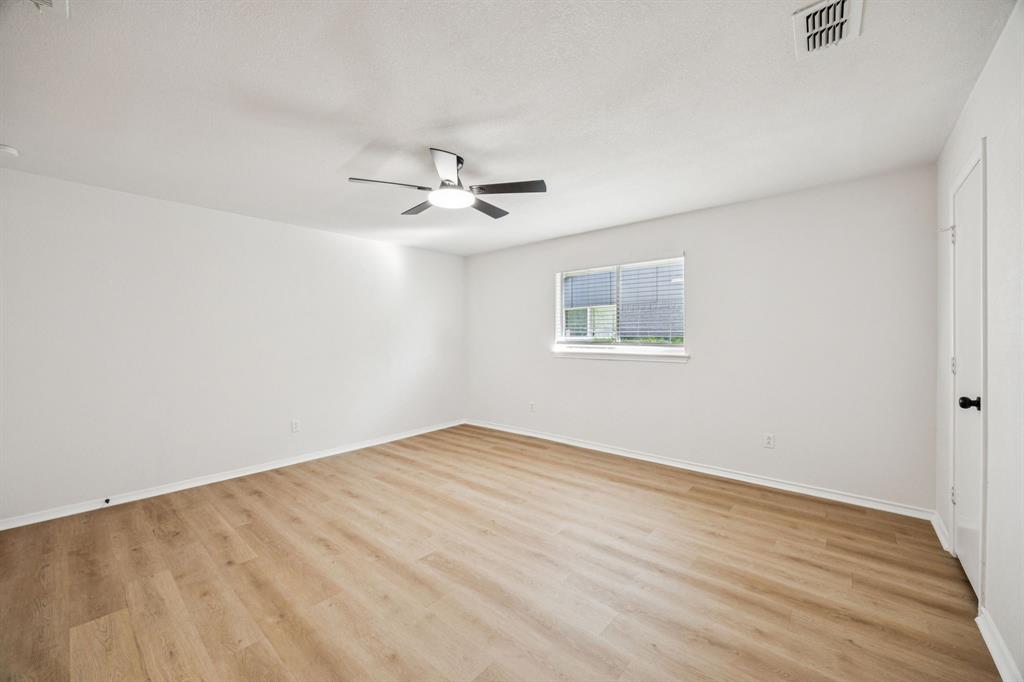 5909 Mark Lane Rowlett, TX 75089 - Photo 13 of 28 a view of an empty room with a window