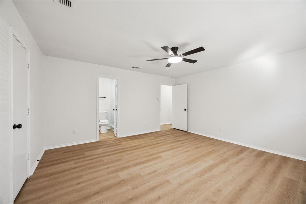 5909 Mark Lane Rowlett, TX 75089 - Photo 14 of 28 wooden floor in an empty room