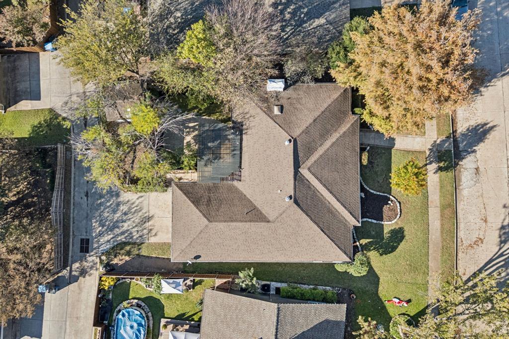 5909 Mark Lane Rowlett, TX 75089 - Photo 28 of 28 front view of a house with a trees