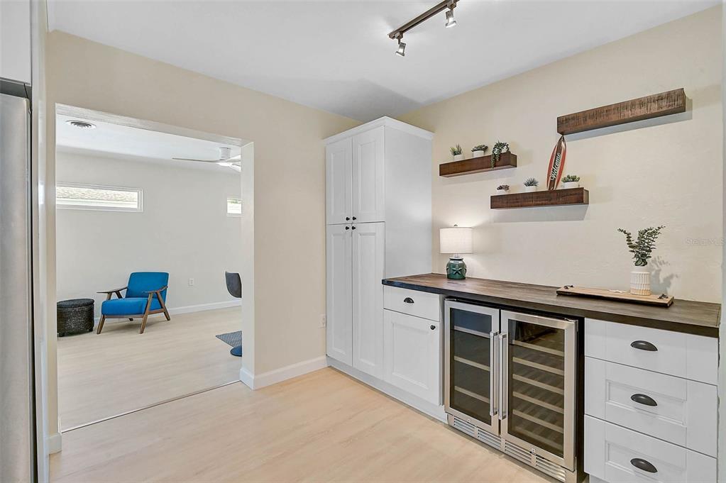 1099 Nokomis Avenue South Venice, FL 34285 - Photo 14 of 68 a kitchen with a sink and cabinets