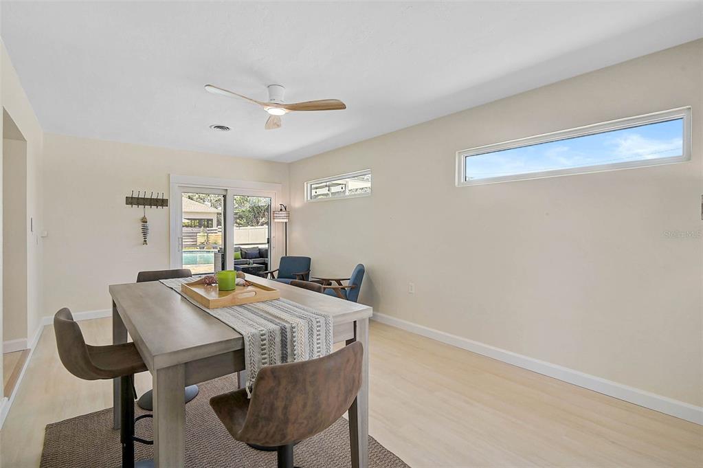 1099 Nokomis Avenue South Venice, FL 34285 - Photo 19 of 68 a view of a dining room with furniture
