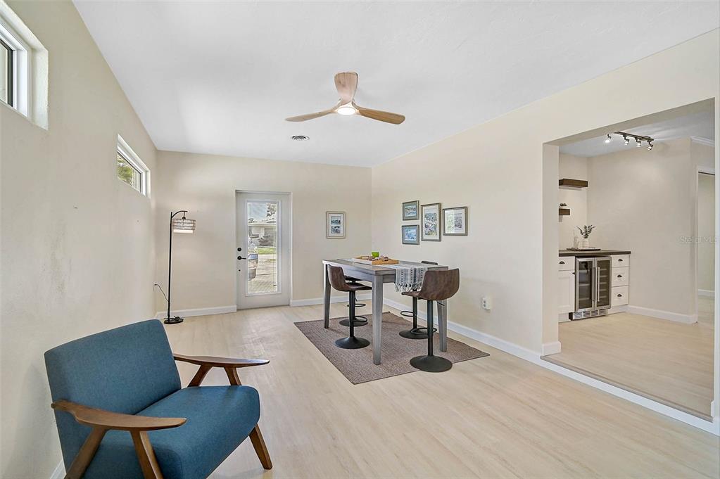 1099 Nokomis Avenue South Venice, FL 34285 - Photo 20 of 68 a view of a livingroom with furniture and a dining table