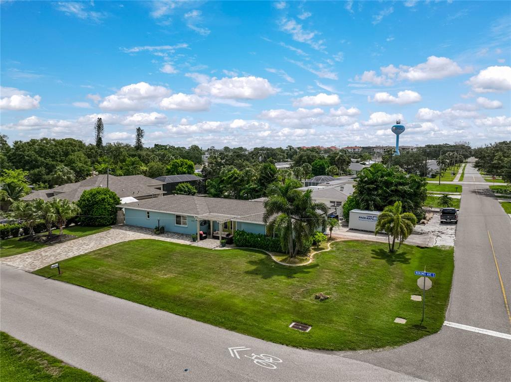 1099 Nokomis Avenue South Venice, FL 34285 - Photo 47 of 68 a view of a lake with a garden