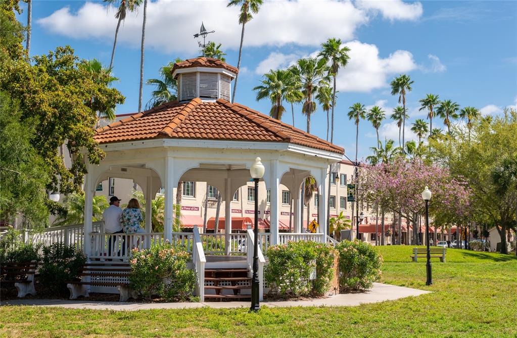 1099 Nokomis Avenue South Venice, FL 34285 - Photo 61 of 68 a front view of a house with garden