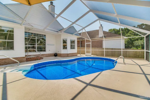 a view of a house with swimming pool