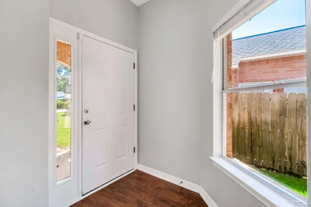 a view of bedroom with window