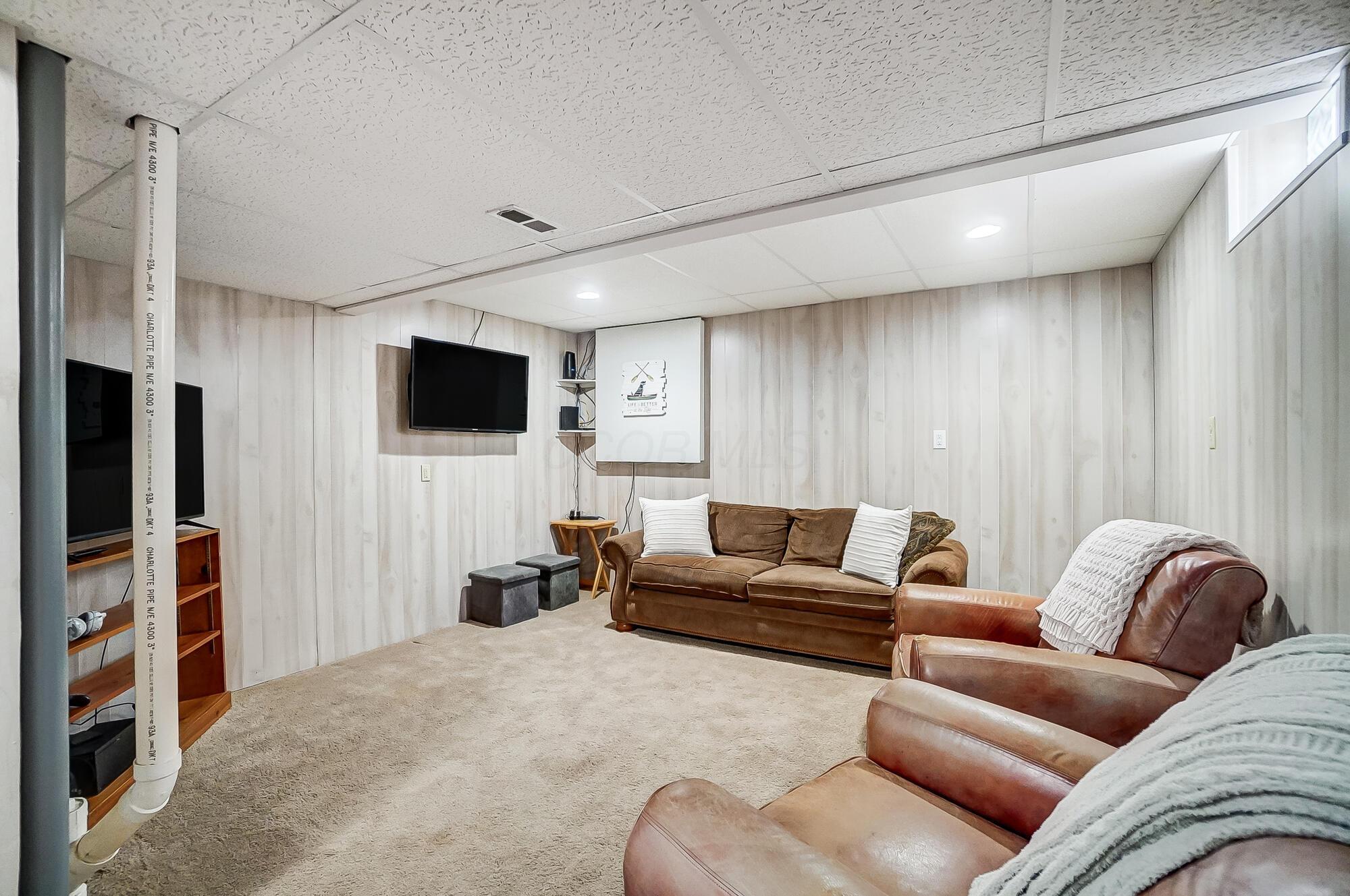 5337 Sutter Home Road Hilliard, OH 43026 - Photo 52 of 72 Finished area in the basement adds extra space for a home office and entertainment room!