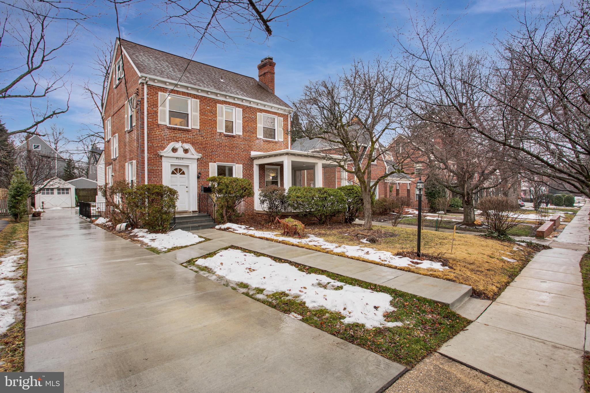 4604 Nottingham Drive Chevy Chase, MD 20815 - Photo 23 of 35 a front view of a house with a yard