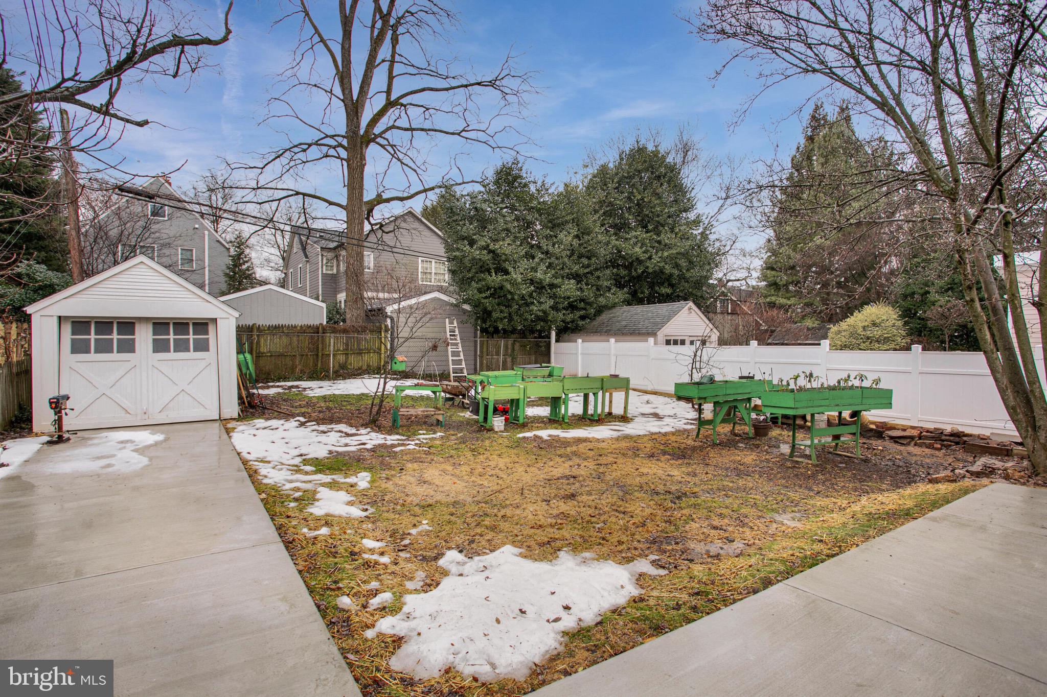 4604 Nottingham Drive Chevy Chase, MD 20815 - Photo 24 of 35 a front view of a house with garden