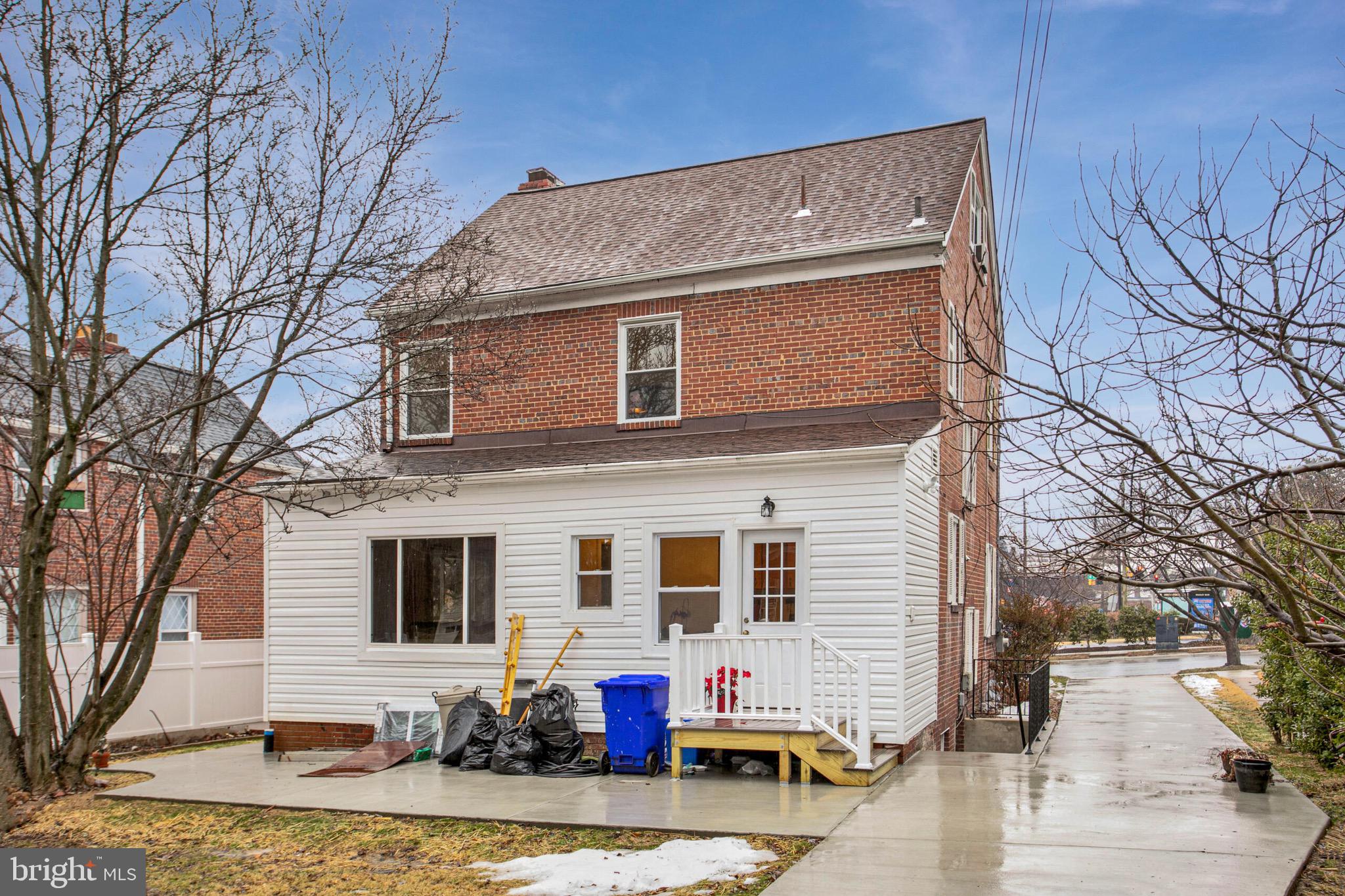 4604 Nottingham Drive Chevy Chase, MD 20815 - Photo 26 of 35 a front view of house with yard and seating area