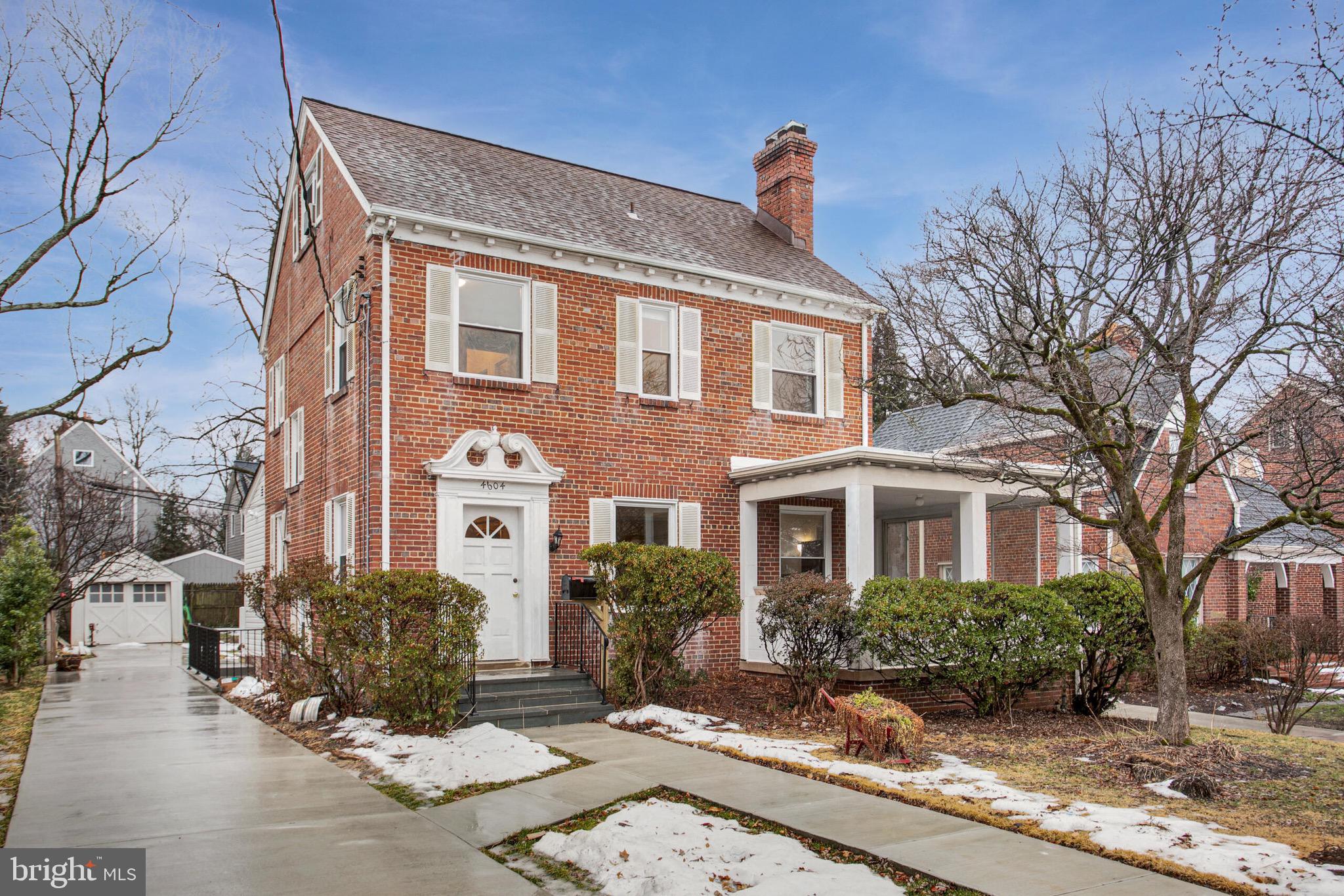 4604 Nottingham Drive Chevy Chase, MD 20815 - Photo 27 of 35 a front view of a house with a yard