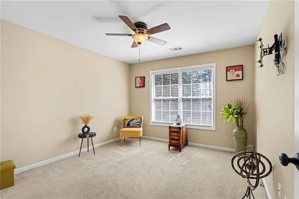 a work room with furniture and windows