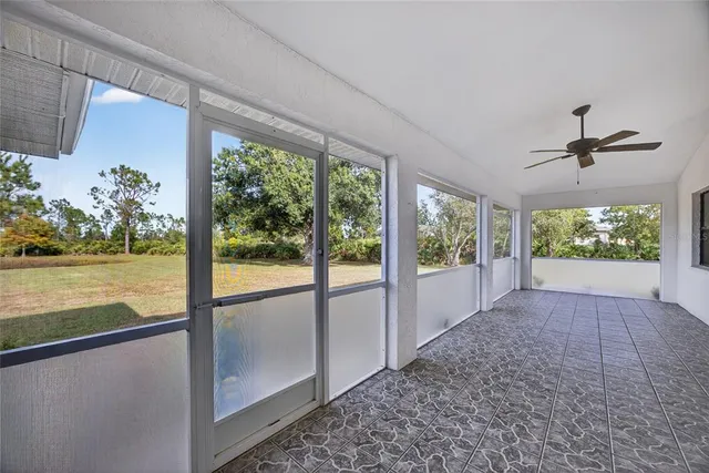 a view of room with window and floor to ceiling window