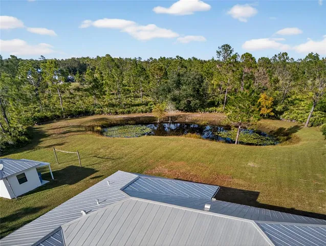 a view of a garden with a lake