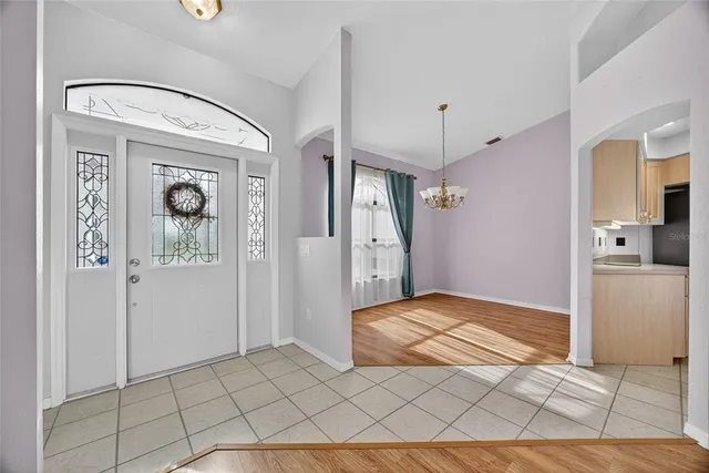 a view of a hallway view with staircase