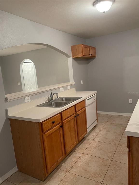 30404 Pongo Way Wesley Chapel, FL 33545 - Photo 11 of 15 a utility room with a sink washer and dryer