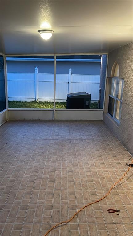 30404 Pongo Way Wesley Chapel, FL 33545 - Photo 14 of 15 a view of room with a projector and a fireplace