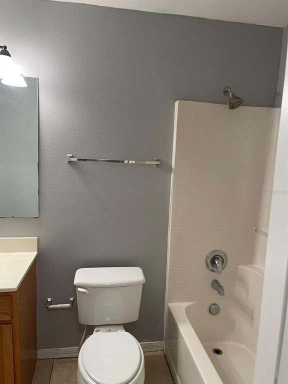 30404 Pongo Way Wesley Chapel, FL 33545 - Photo 2 of 15 a bathroom with a sink a toilet and bathtub
