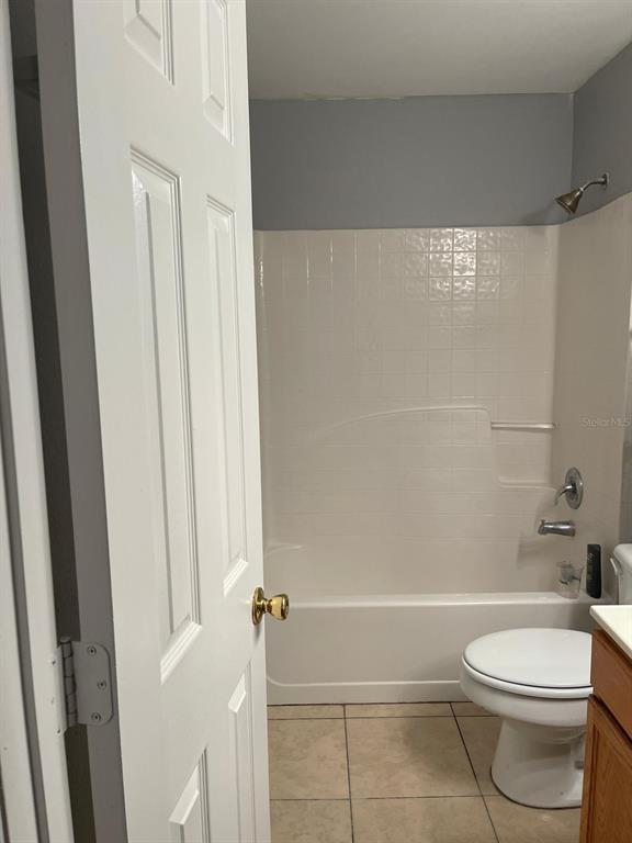 30404 Pongo Way Wesley Chapel, FL 33545 - Photo 4 of 15 a bathroom with a toilet and a shower