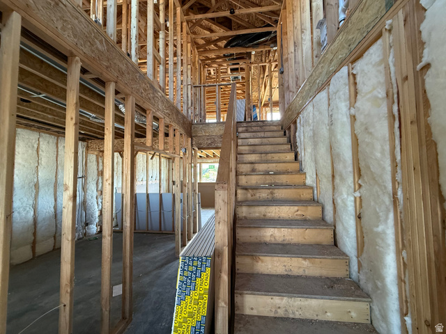 3318 South 1000 West Logan, UT 84321 - Photo 8 of 12 Open-concept interior framing with a prominent staircase